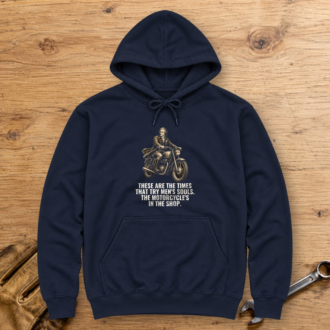 Thomas Paine Bike in the Shop Hoodie - Navy - bench
